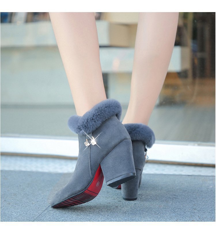 Martens boots with large pointed rhinestones